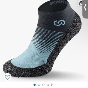 Skinner sock-shoes - brand new in box!  Never worn. Size small (women’s 8.5-9.5)
